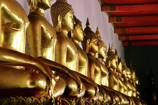 Statue Art Print featuring the photograph Gold Buddha Statue At Wat Pho Temple by Dangdumrong