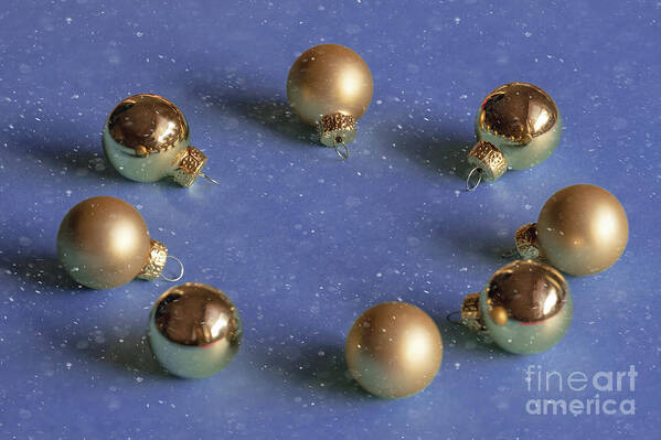 Decoration Art Print featuring the photograph Golden christmas balls on the snowy background by Marina Usmanskaya