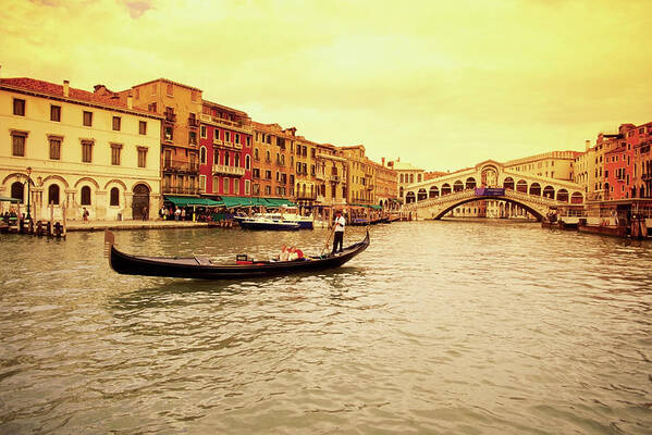Row House Art Print featuring the photograph Gondola In A Canal, Rialto Bridge by Medioimages/photodisc