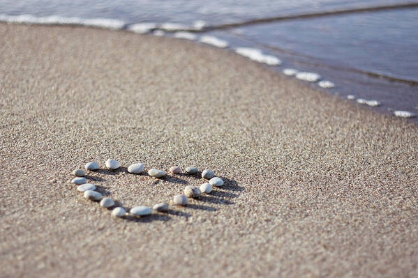 Tranquility Art Print featuring the photograph Heart Made Of Pebbles On Sand by Angelika Kaczanowska