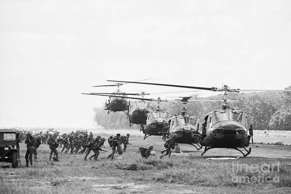 Rifle Art Print featuring the photograph Helicopters Landing In Formation by Bettmann