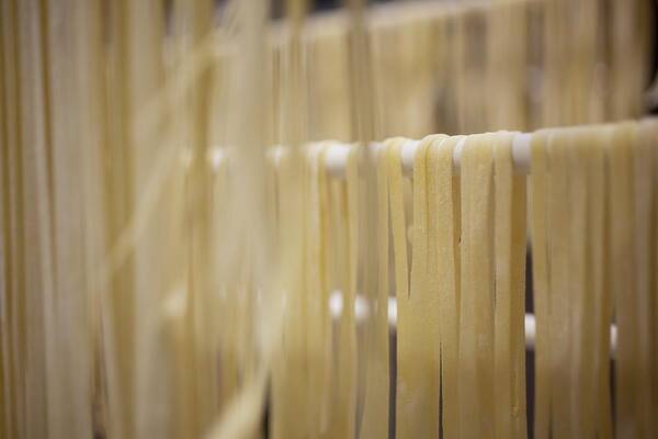 Ip_11365418 Art Print featuring the photograph Homemade Fettuccine Drying On A Rack by Rene Comet