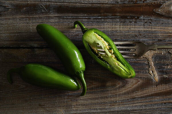 Fresh Art Print featuring the photograph Jalapenos on rustic background by Cuisine at Home