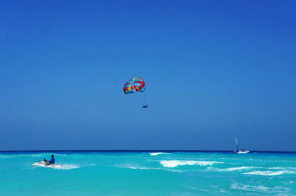 Motorboat Art Print featuring the photograph Jet Skiing And Parasailing In The by Tony Ibarra Photography