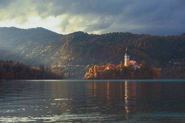 Slovenia Art Print featuring the photograph Last Rays In Bled by Mike Kreiten