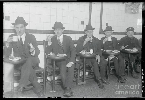 People Art Print featuring the photograph Men Eating Their Lunches by Bettmann