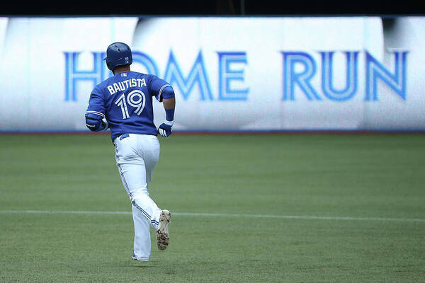 American League Baseball Art Print featuring the photograph Milwaukee Brewers V Toronto Blue Jays by Tom Szczerbowski