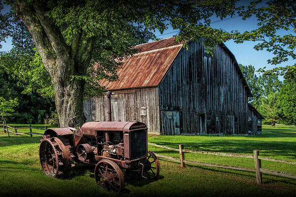 Barn Art Print featuring the photograph Old Vintage McCormick Deering Tractor with old weathed Barn by Randall Nyhof