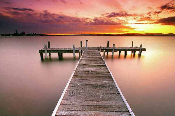 Tranquility Art Print featuring the photograph Pier In Lake Macquarie At Sunset by Yury Prokopenko