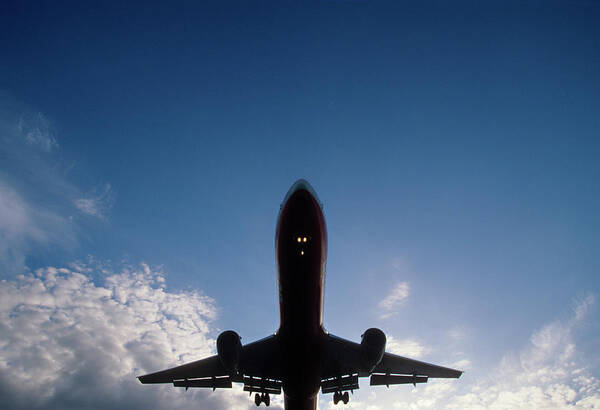 Montego Bay Art Print featuring the photograph Silhouette Of A Jet Plane Landing by Wesley Hitt