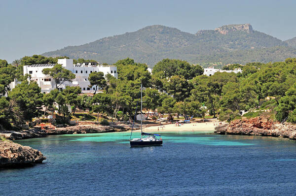 Sailboat Art Print featuring the photograph Small Beach On The Island Of Majorca by Maxian