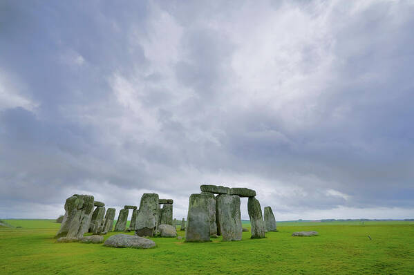 Prehistoric Era Art Print featuring the photograph Stonehenge And Storm Clouds by John Wang