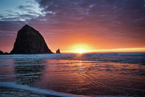 Sunset Art Print featuring the photograph Sunset at the Rock - Cannon Beach by Jeanette Mahoney
