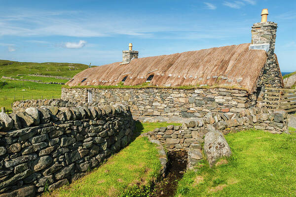 Garenin Art Print featuring the photograph Thatched cottage at Garenin Blackhouse Village, Isle of Lewis by David Ross