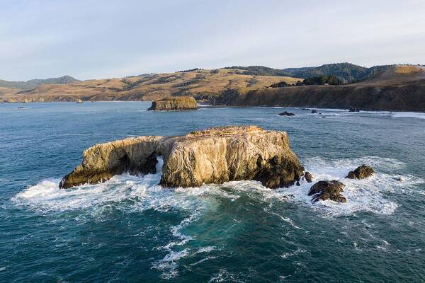 Landscapeaerial Art Print featuring the photograph The Pacific Ocean Washes Against A Sea by Ethan Daniels