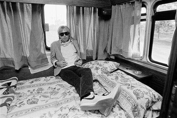 Tom Petty Art Print featuring the photograph Tom Petty Poses In His Tour Bus by George Rose