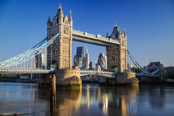 London Art Print featuring the photograph Tower bridge in London, England, seen on at sunrise on a clear day. by George Afostovremea