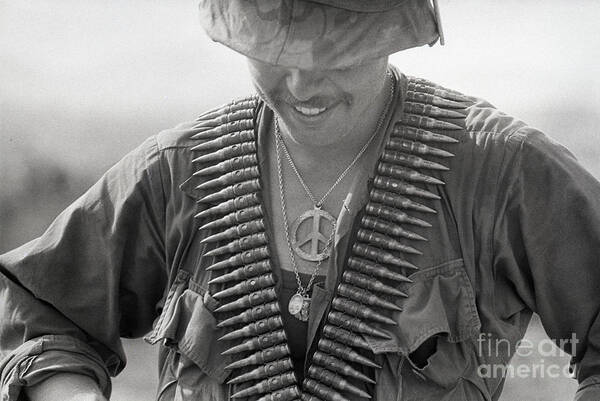 Vietnam War Art Print featuring the photograph Trooper Wear Peace Symbol And Bandolier by Bettmann