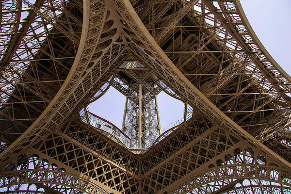 Paris Art Print featuring the photograph Under The Eiffel Tower by Rocco Silvestri