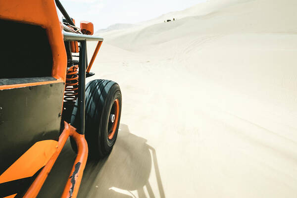 Orange Art Print featuring the photograph View From A Sand Buggy In The Desert Against A Blue Sky by Cavan Images