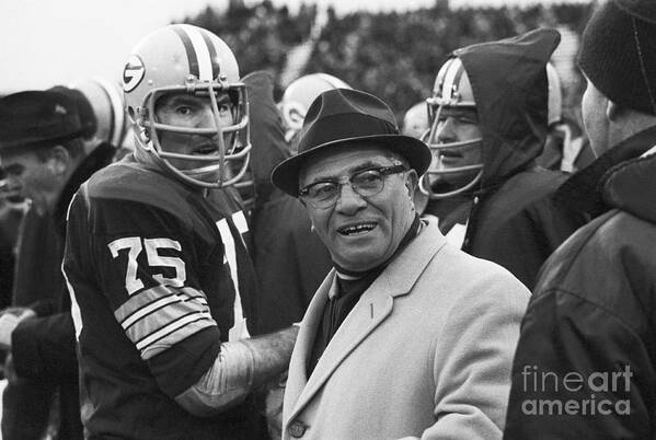 Playoffs Art Print featuring the photograph Vince Lombardi With Football Players by Bettmann