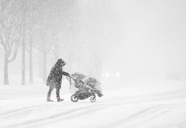 Walking Art Print featuring the photograph Walking In A Winter Storm by Emma Zhao