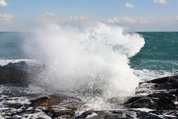 Waves Art Print featuring the photograph Waves Crashing On Rocks At Beach by Cavan Images