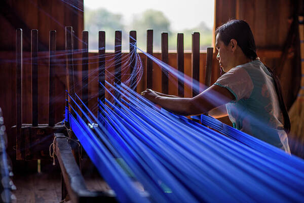 People Art Print featuring the photograph Woman Weaving Blue Silk Thread by Merten Snijders