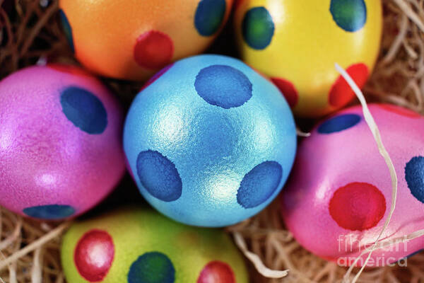 Easter Art Print featuring the photograph Colorful Easter eggs with polka dots in a basket #1 by Mendelex Photography