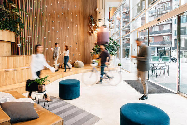 Corporate Business Art Print featuring the photograph Commuters arriving to office lobby #1 by Ferrantraite