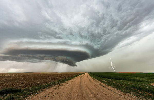 Supercell Art Print featuring the photograph Down The Dirt Road #1 by Marcus Hustedde