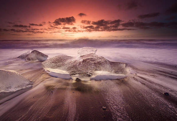 Scenics Art Print featuring the photograph Icebergs on a beach at sunrise. #1 by Alex Saberi