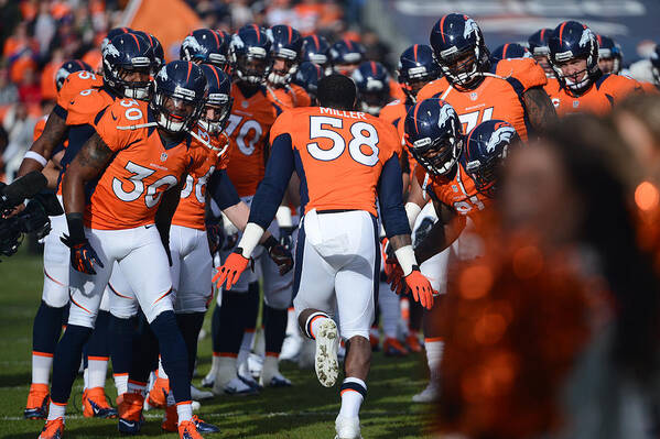 American Football Art Print featuring the photograph Kansas City Chiefs v Denver Broncos #1 by Garrett Ellwood