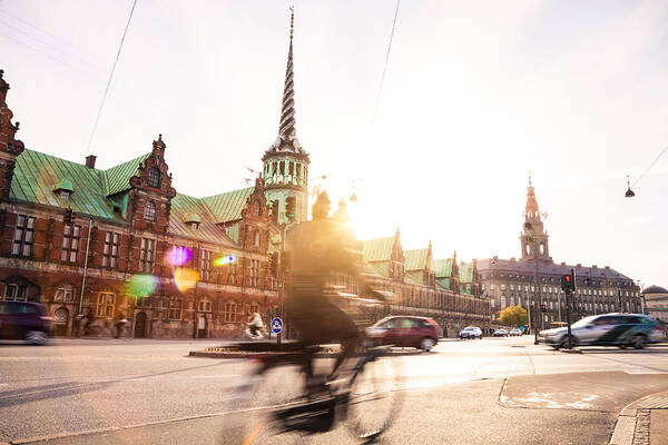 Oresund Region Art Print featuring the photograph People cycling in Copenhagen #1 by LeoPatrizi