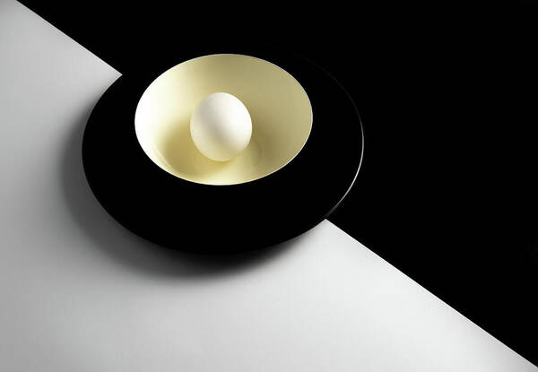 Still-life Art Print featuring the photograph Single fresh white egg on a yellow bowl by Michalakis Ppalis