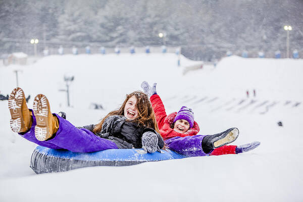 Sister Art Print featuring the photograph Snowtubing #1 by Alex Potemkin