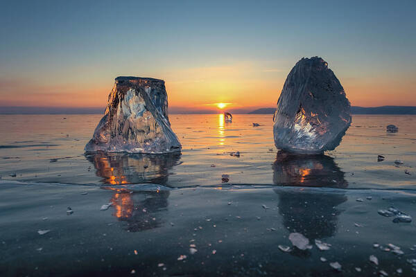 Ice Art Print featuring the photograph Sunset on frozen Lake Baikal #1 by Mikhail Kokhanchikov