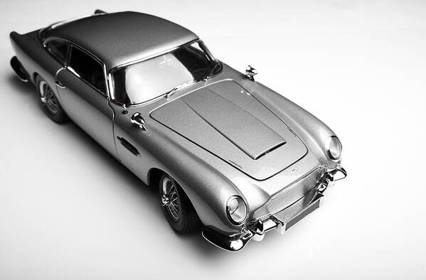 English Culture Art Print featuring the photograph Aston Martin DB5 Model On White #2 by Simonbradfield