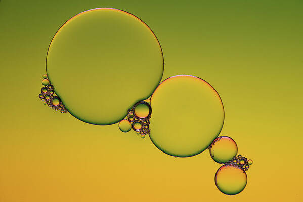 Connection Art Print featuring the photograph Bright abstract, yellow background with flying bubbles by Michalakis Ppalis