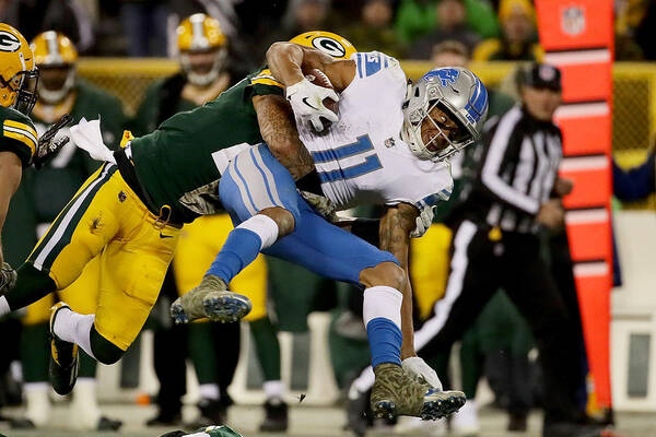 Green Bay Art Print featuring the photograph Detroit Lions v Green Bay Packers #3 by Jonathan Daniel