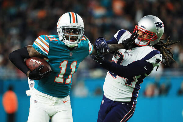 Miami Gardens Art Print featuring the photograph New England Patriots v Miami Dolphins #5 by Mike Ehrmann