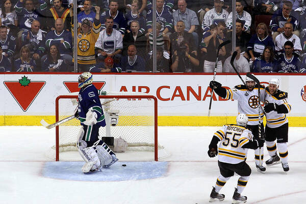 Playoffs Art Print featuring the photograph Boston Bruins v Vancouver Canucks - Game Seven #8 by Bruce Bennett