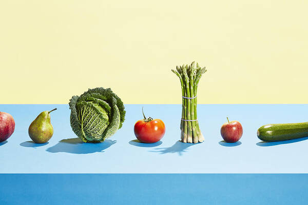 Diversity Art Print featuring the photograph A row of different fruit and vegetables by Richard Drury