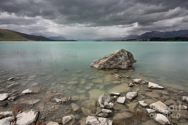 Beautiful Art Print featuring the photograph A very gloomy afternoon at Lake Tekapo by Anges Van der Logt