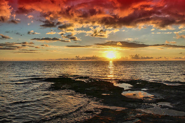 Sun Sunrise Rise Dawn Morning Water Clear Waves Rocks Red Orange Reflections Atlantic Florida Art Print featuring the photograph Amanecer by Montez Kerr