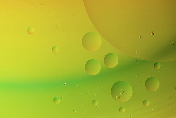 Connection Art Print featuring the photograph Bright abstract green and yellow background with flying bubbles by Michalakis Ppalis