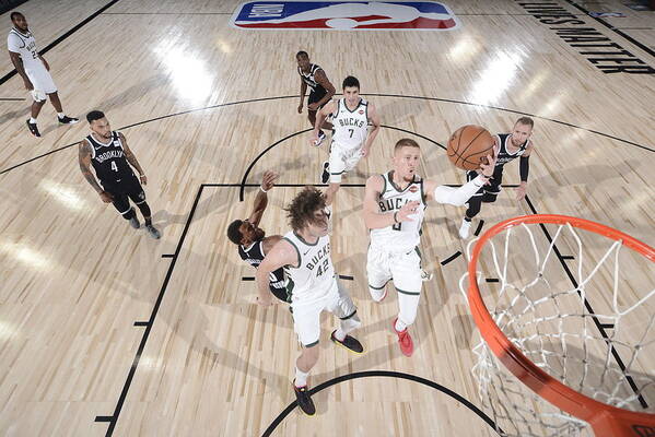 Donte Divincenzo Art Print featuring the photograph Brooklyn Nets v Milwaukee Bucks by David Dow