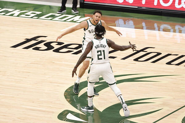 Bryn Forbes Art Print featuring the photograph Bryn Forbes and Jrue Holiday by Kamil Krzaczynski