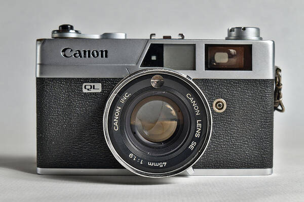 Canon Art Print featuring the photograph Canon analogue camera, model Canonet QL19. 35mm film Camera Front by Angelo DeVal