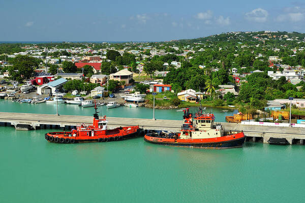 Caribbean Art Print featuring the photograph Caribbean Tugboats with Antigua Skyline by Luke Moore